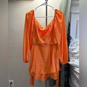 Orange long sleeve flowy romper